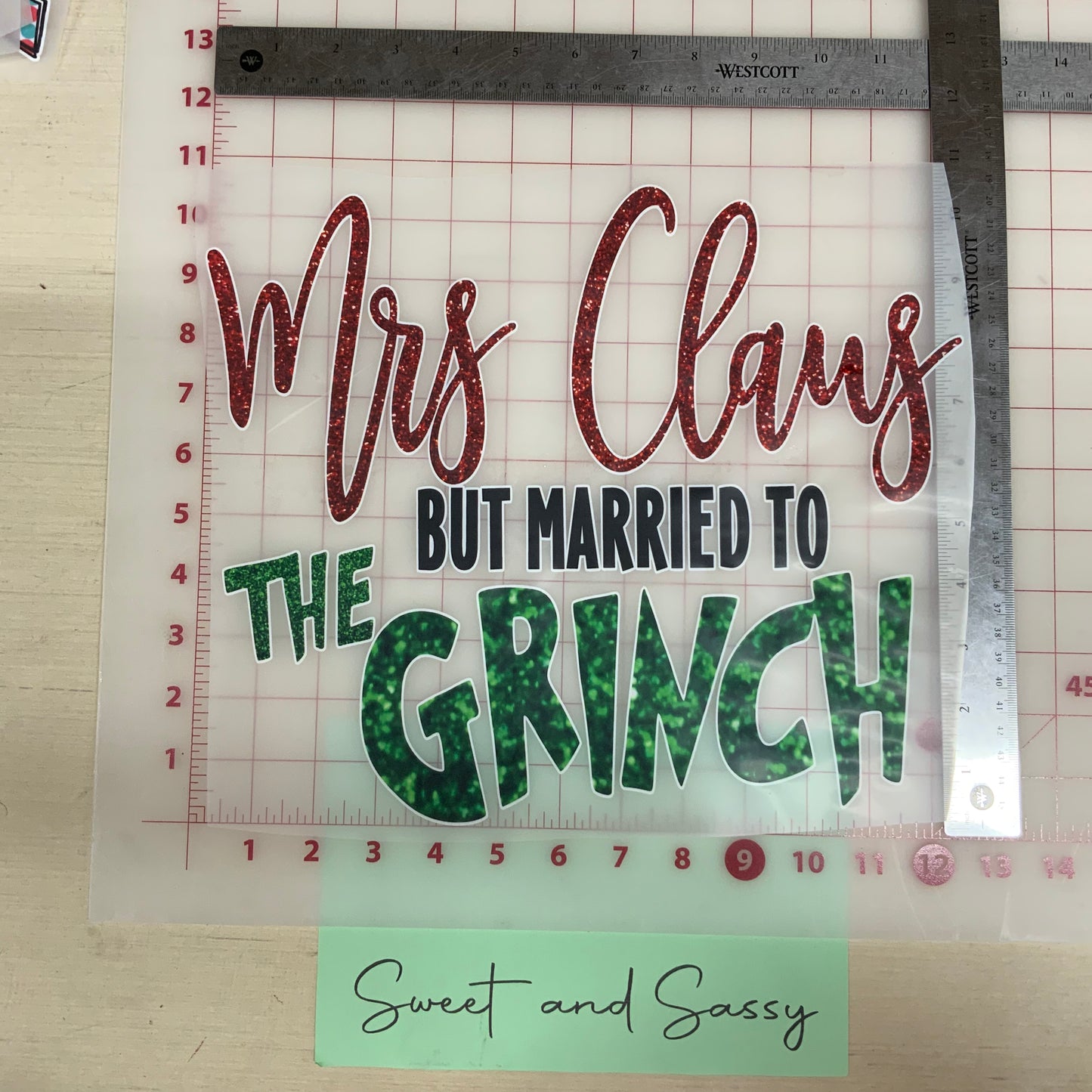Mrs. Claus but married to the Grinch glitter DTF Transfer Design