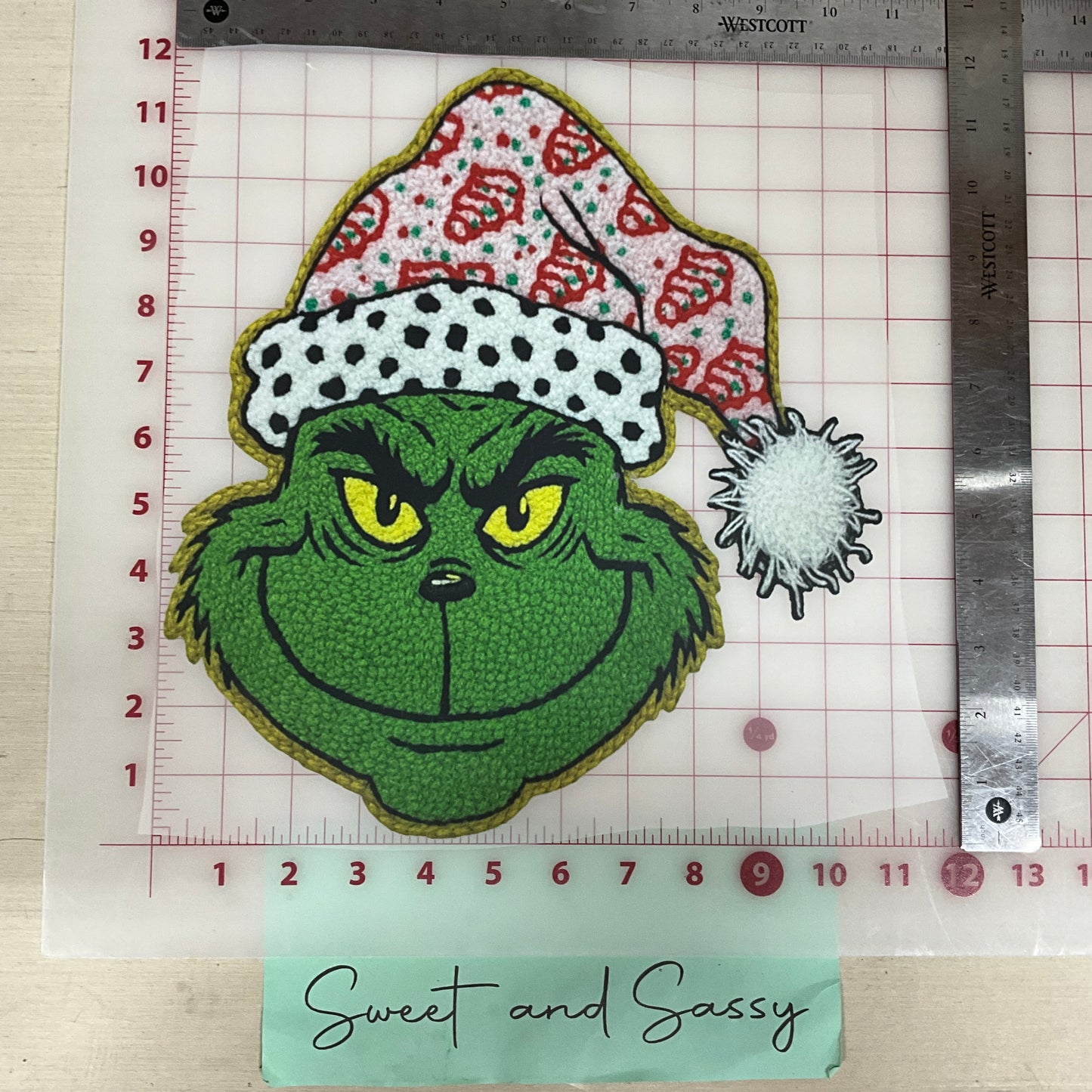grinch yarn with santa hat snack cakes DTF Transfer Design