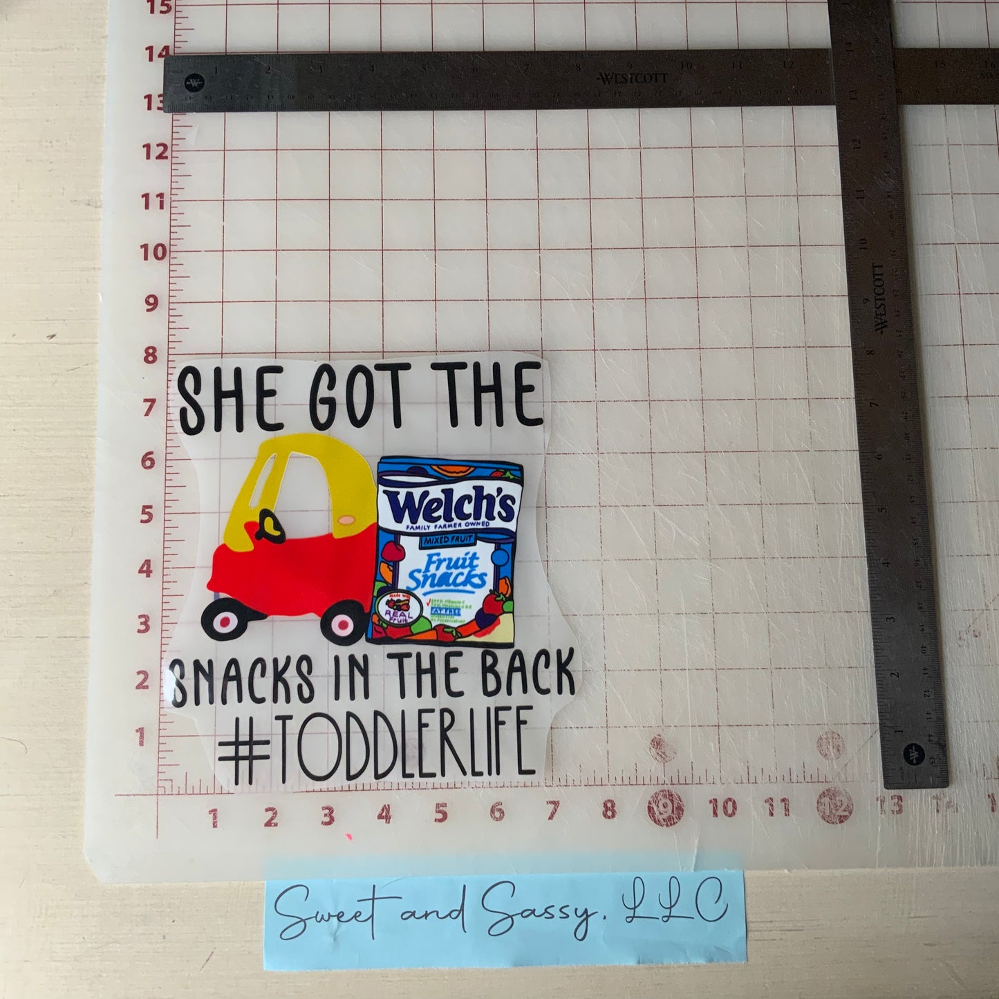 "She got the snacks in the back #TODDLERLIFE" Mini DTF Transfer Design